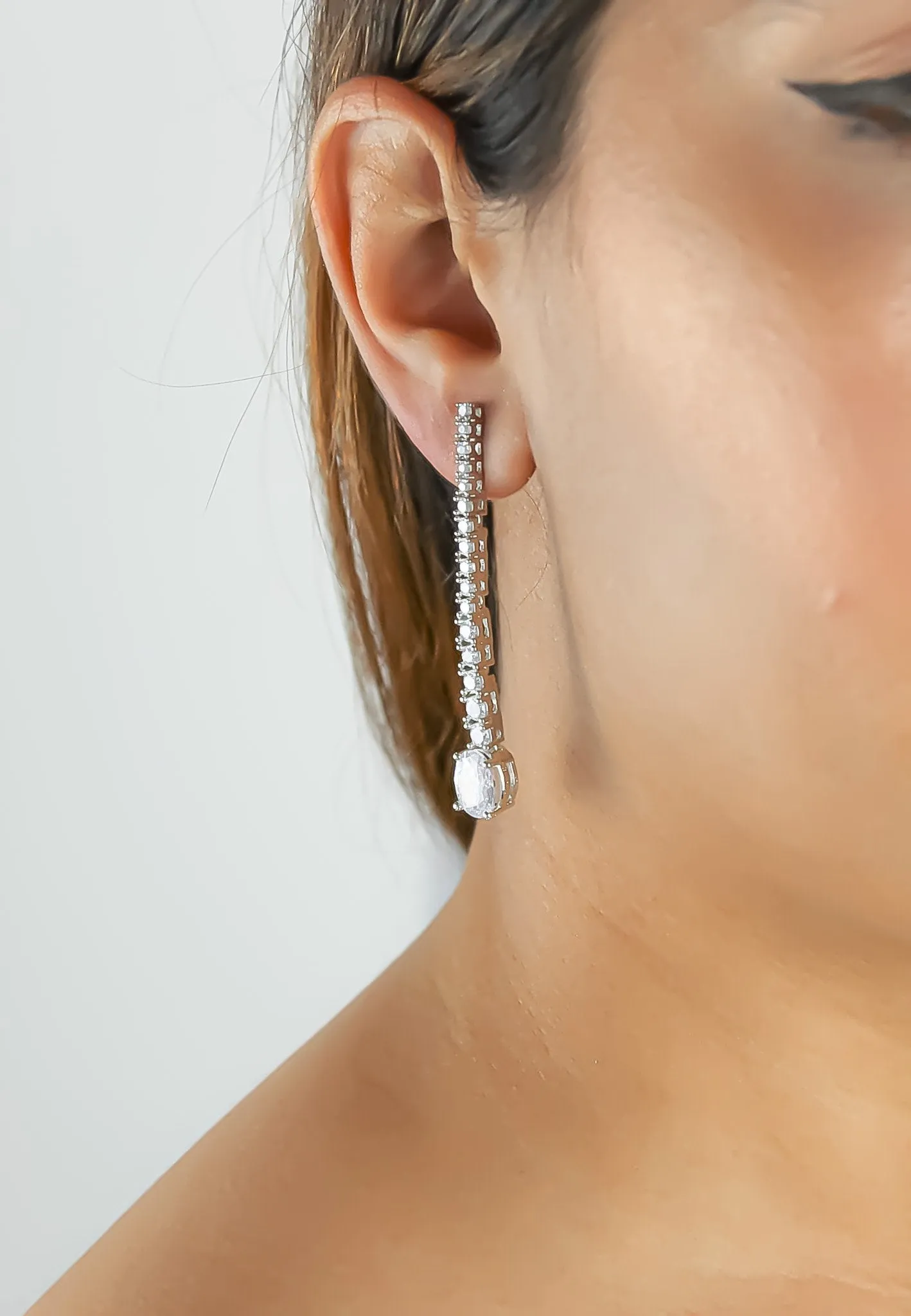 "Marbella Zircon Earrings: Lightweight, 18K Gold or Silver Plated"
Keywords: Marbella, Zircon, Earrings, Lightweight, Gold-plated, Silver-plated.