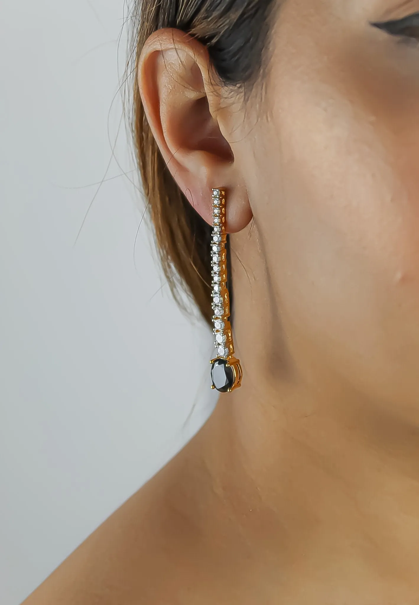 "Marbella Zircon Earrings: Lightweight, 18K Gold or Silver Plated"
Keywords: Marbella, Zircon, Earrings, Lightweight, Gold-plated, Silver-plated.