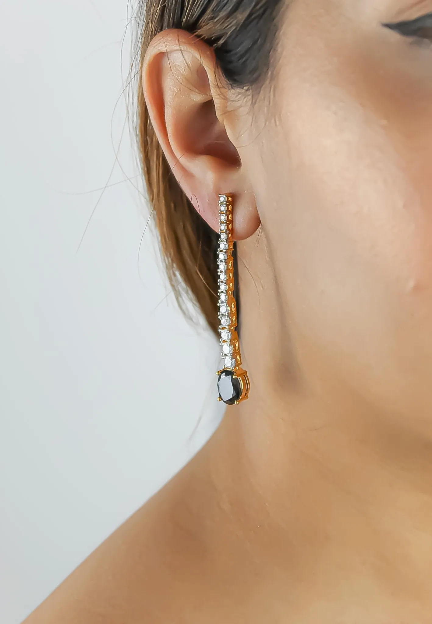 "Marbella Zircon Earrings: Lightweight, 18K Gold or Silver Plated"
Keywords: Marbella, Zircon, Earrings, Lightweight, Gold-plated, Silver-plated.