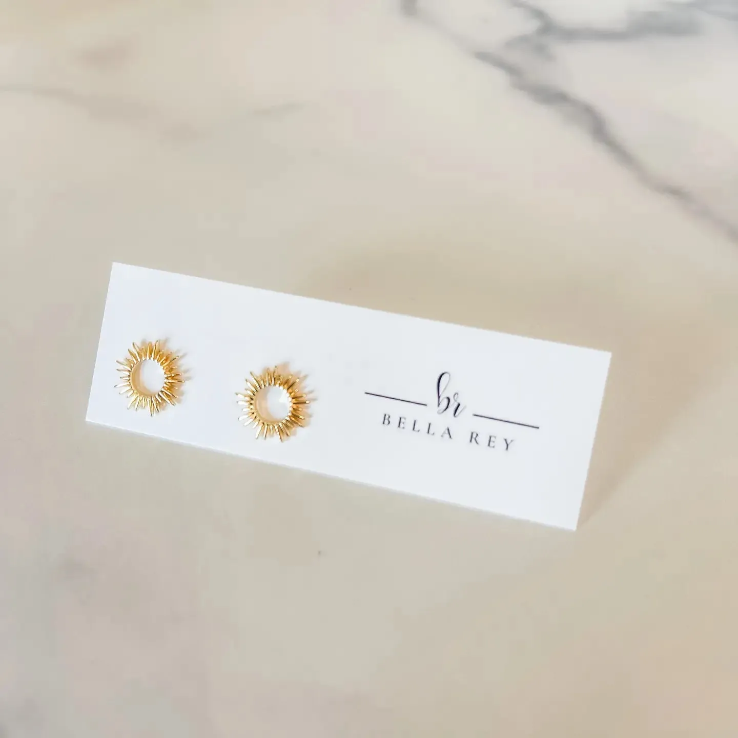 The Ruby Gold Plated Starburst Stud Earrings by Bella Rey