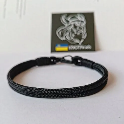 Thin black paracord and carabiner bracelet. Unloading camp. Surfer bangle. Extreme durable.