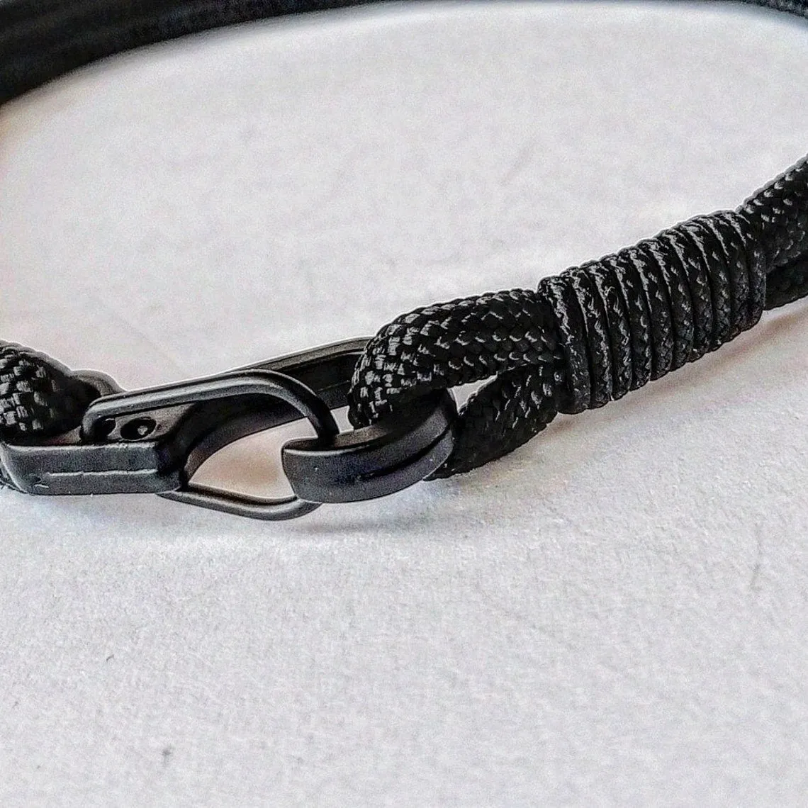 Thin black paracord and carabiner bracelet. Unloading camp. Surfer bangle. Extreme durable.