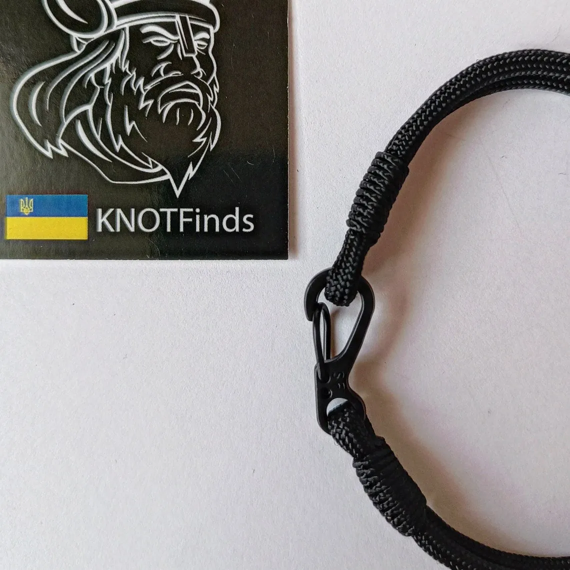 Thin black paracord and carabiner bracelet. Unloading camp. Surfer bangle. Extreme durable.